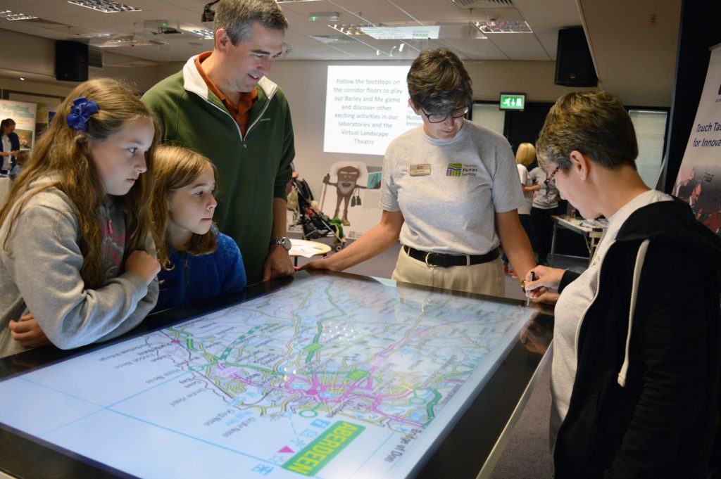 Researcher explains work to public