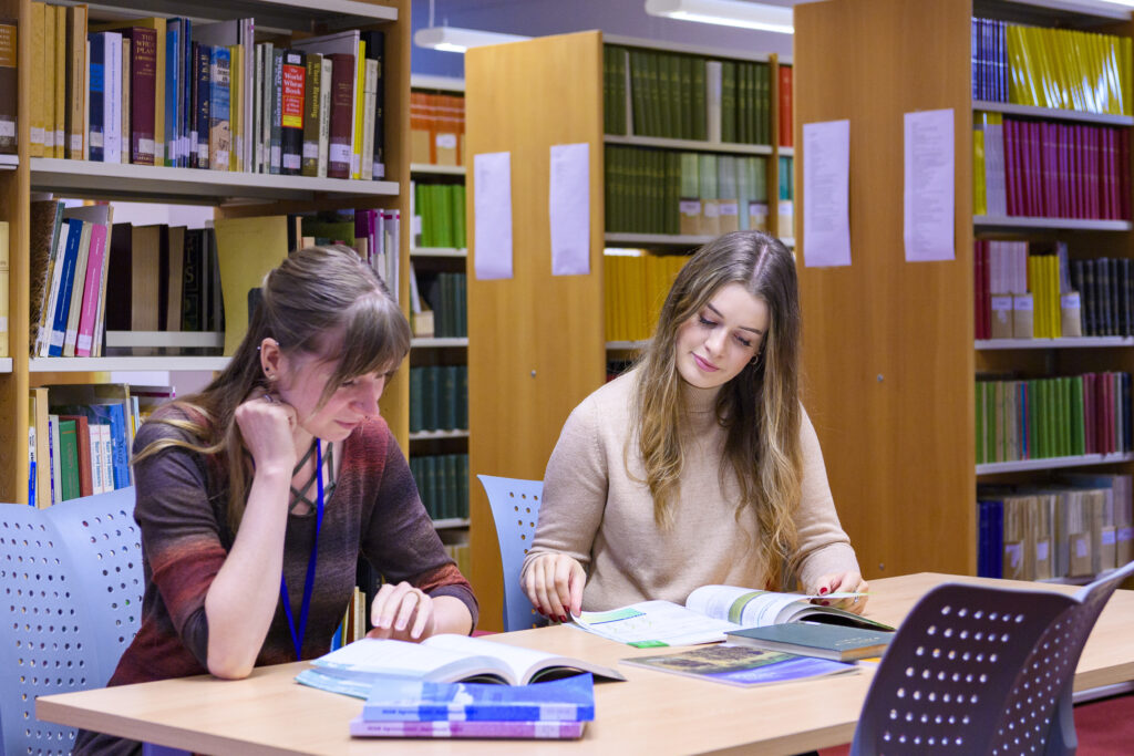 researchers reading reports